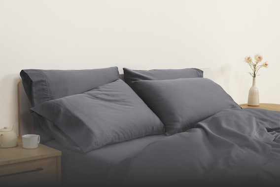 Grey Sateen Sheets and Pillowcases on bed