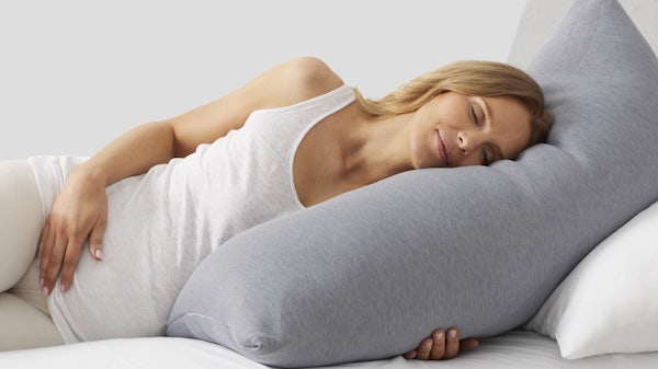 Model sleeping with Hug Body Pillow