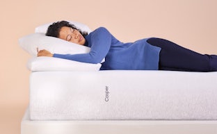 Woman sleeping on Casper Wave mattress